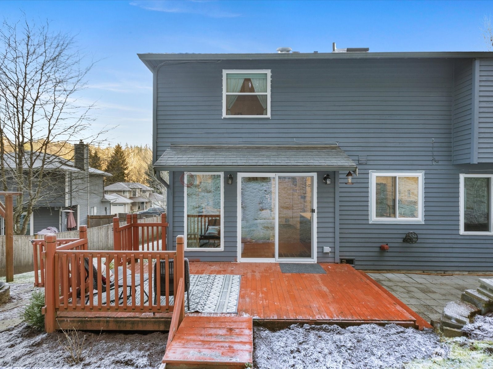 16121 Southeast 156th Street Renton, WA 98058 - Photo 33 of 39 a view of a house with a wooden floor and a barbeque