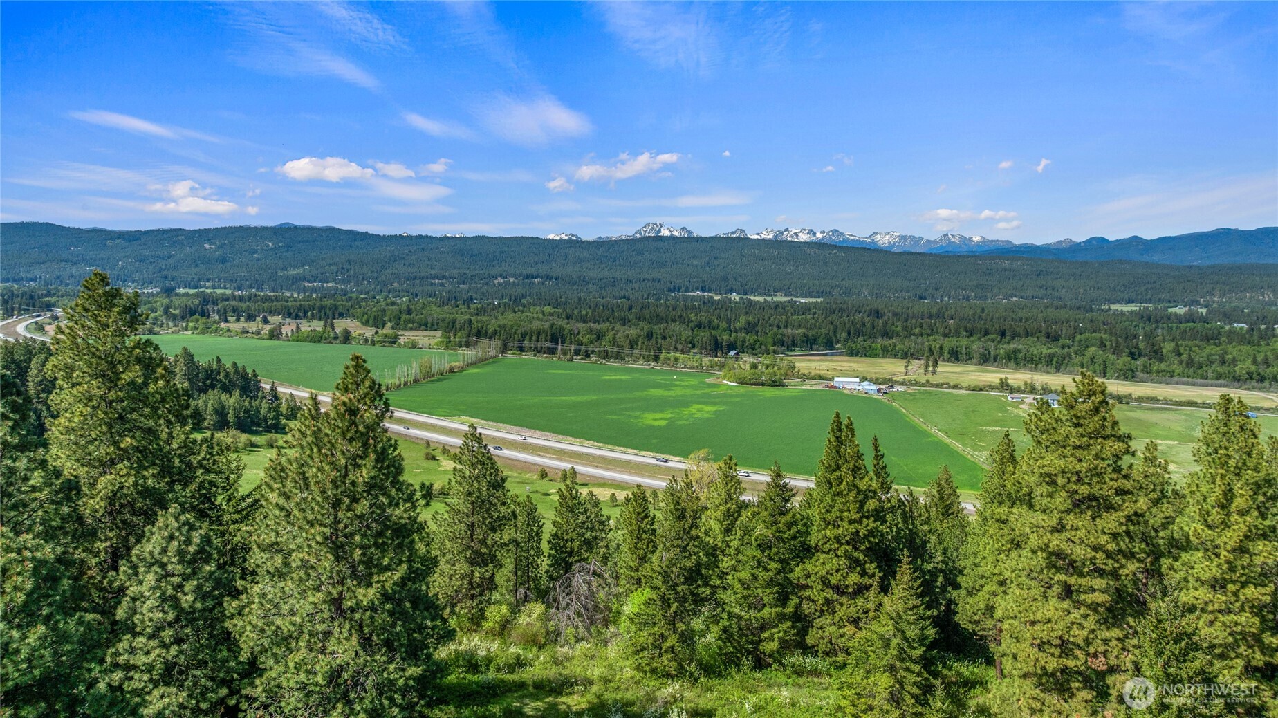 66-x1 Upper Peoh Point Road Cle Elum, WA 98922 - Photo 17 of 32 a view of a lake with a big yard