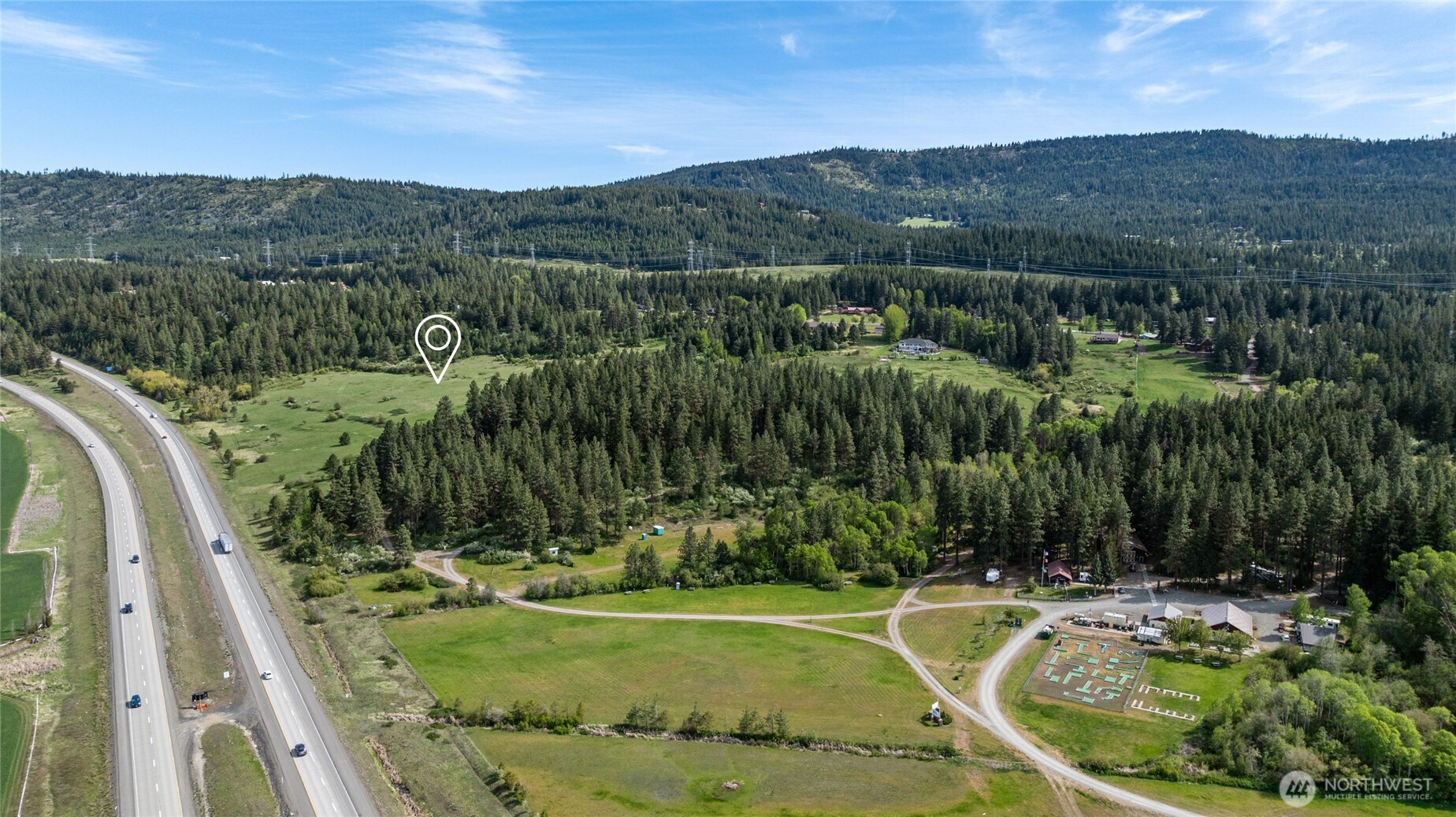 66-x1 Upper Peoh Point Road Cle Elum, WA 98922 - Photo 29 of 32 a view of a swimming pool with a yard