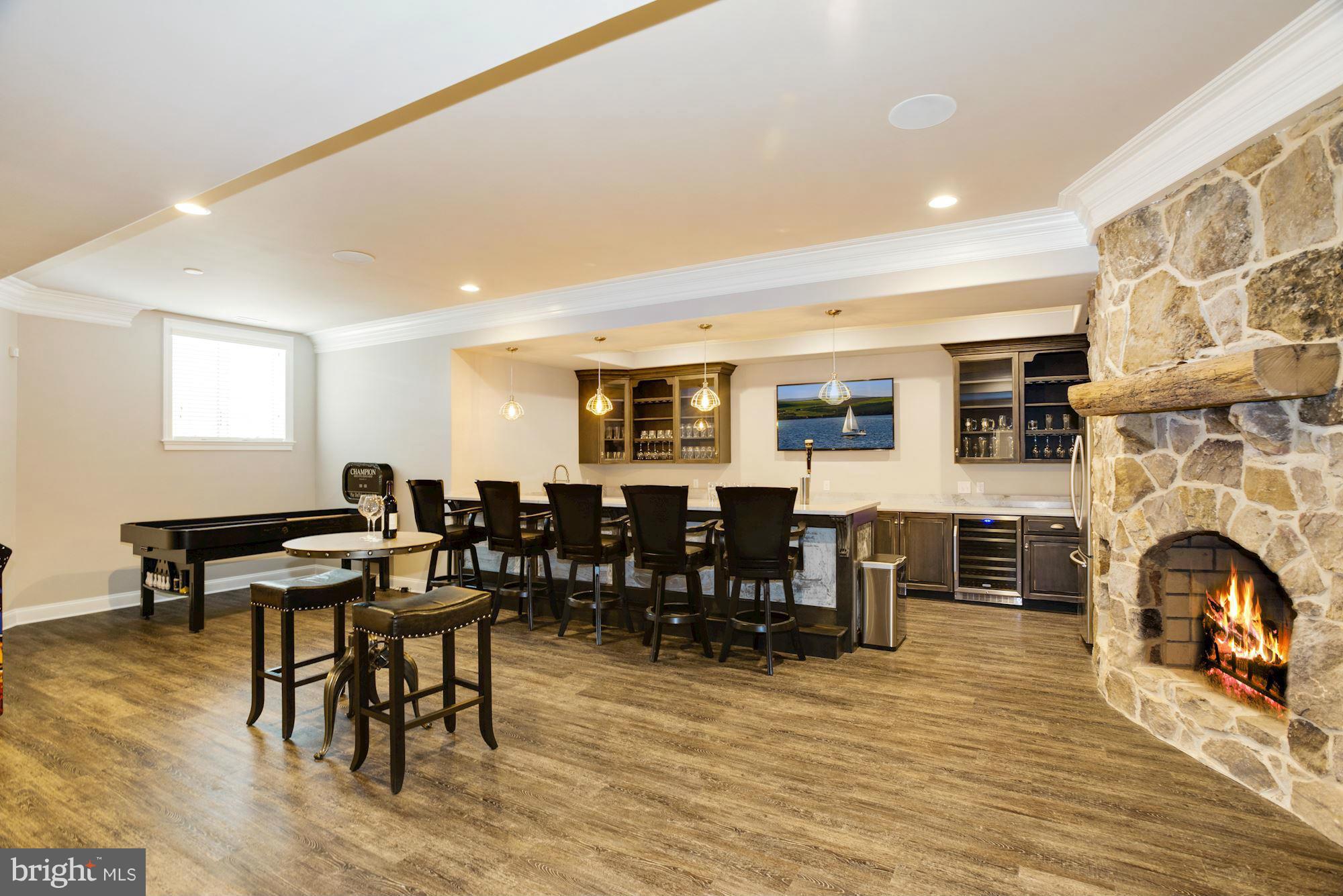 3718 Blenheim Road Phoenix, MD 21131 - Photo 24 of 30 Lower Level Wet Bar and Fireplace