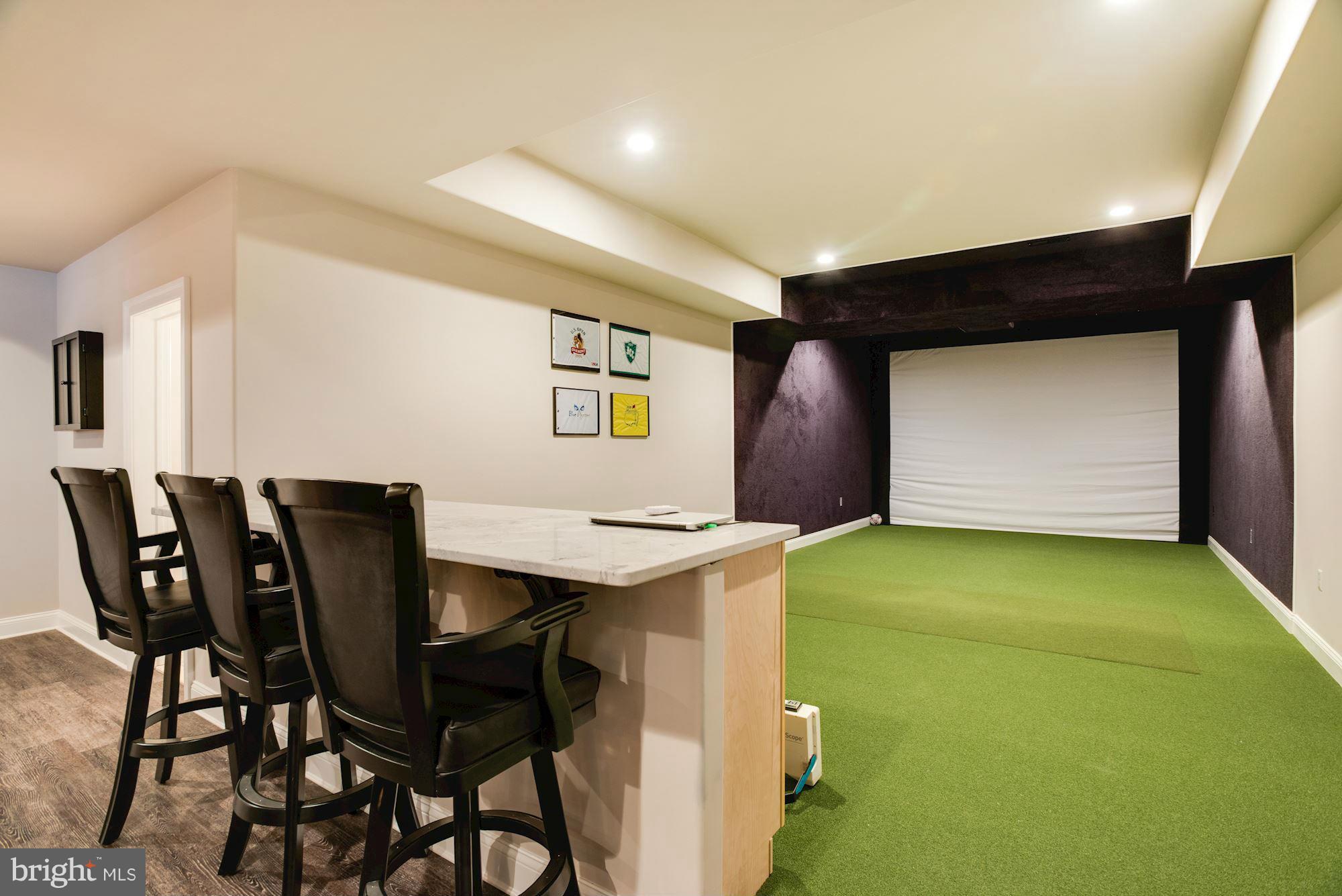 3718 Blenheim Road Phoenix, MD 21131 - Photo 26 of 30 Lower Level Golf Simulator with Spectator Bar