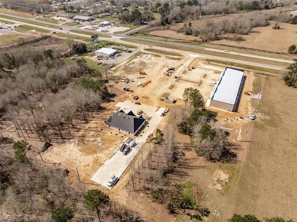 a view of a roof with sitting area