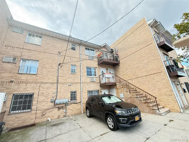 a car parked in front of a house