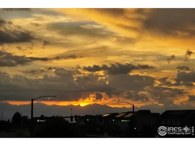 a view of a room with wooden walls