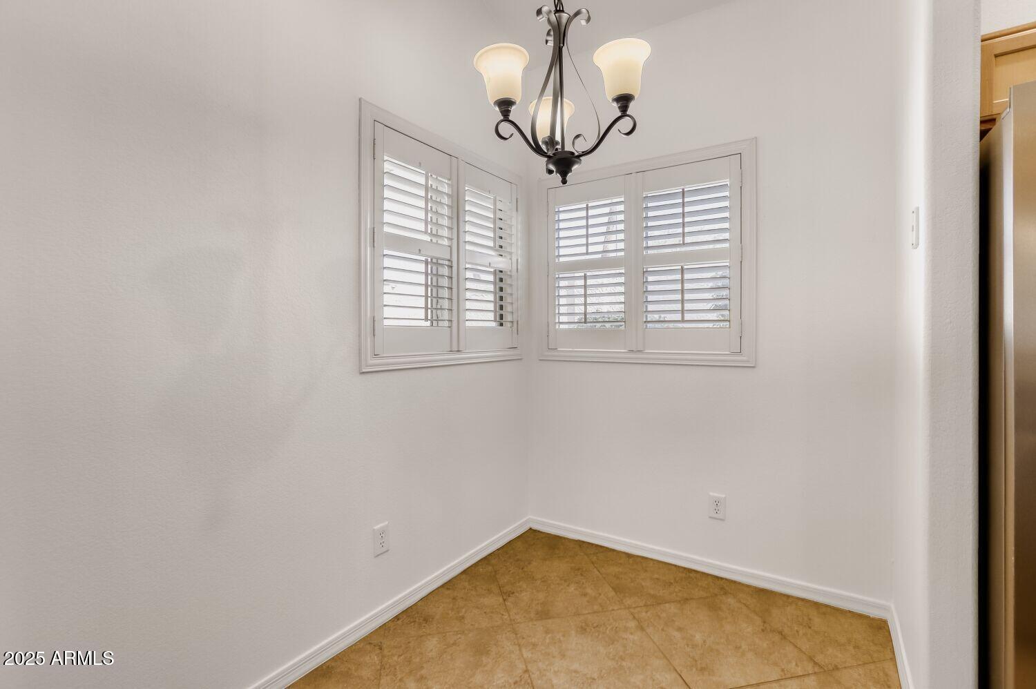 7101 West Beardsley Road, Unit 1403 Glendale, AZ 85308 - Photo 18 of 40 a view of empty room with window