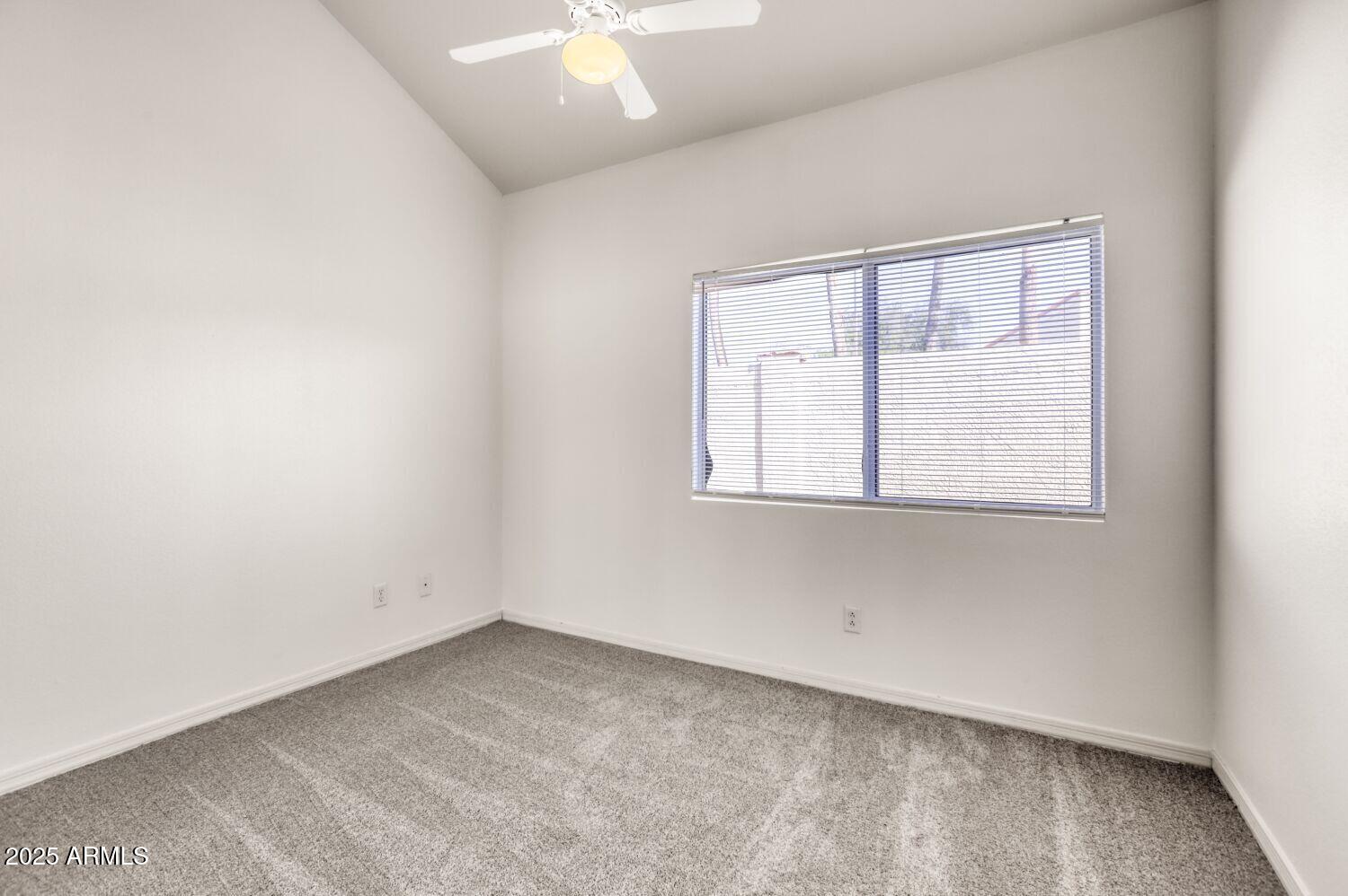 7101 West Beardsley Road, Unit 1403 Glendale, AZ 85308 - Photo 26 of 40 an empty room with a window