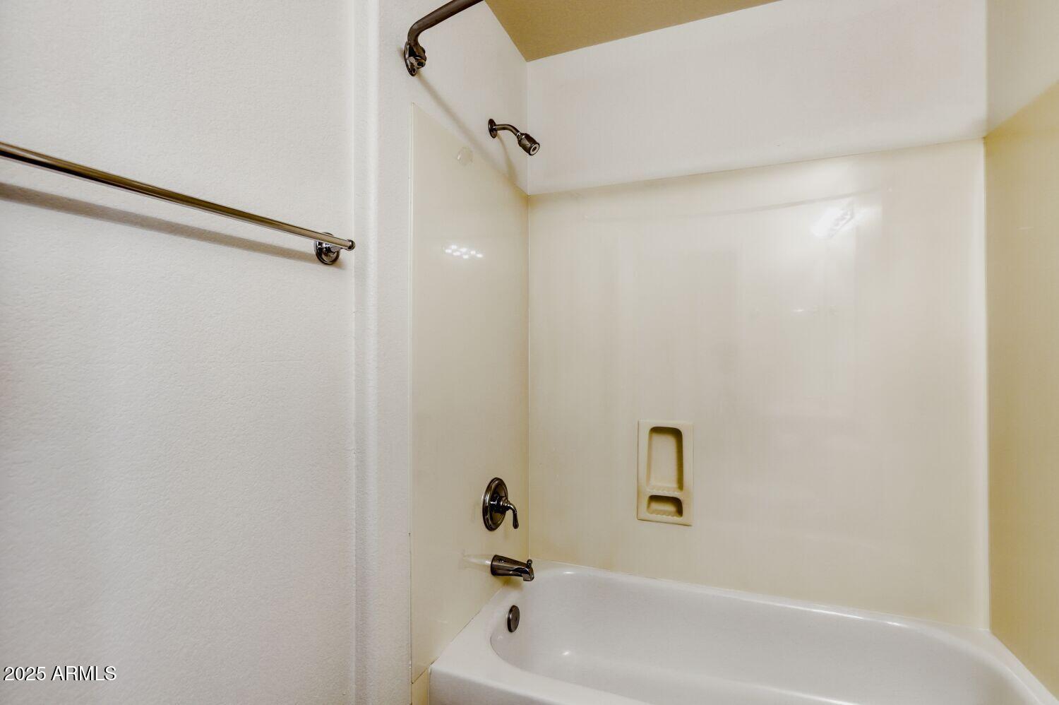 7101 West Beardsley Road, Unit 1403 Glendale, AZ 85308 - Photo 29 of 40 a bathroom with a bathtub