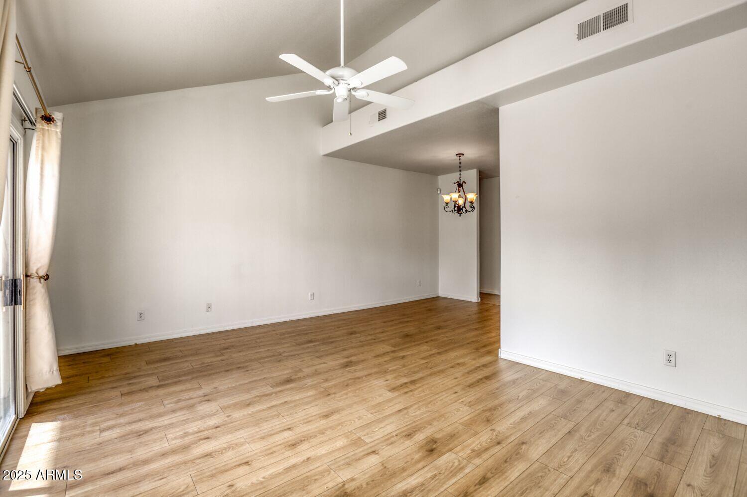 7101 West Beardsley Road, Unit 1403 Glendale, AZ 85308 - Photo 7 of 40 wooden floor in an empty room