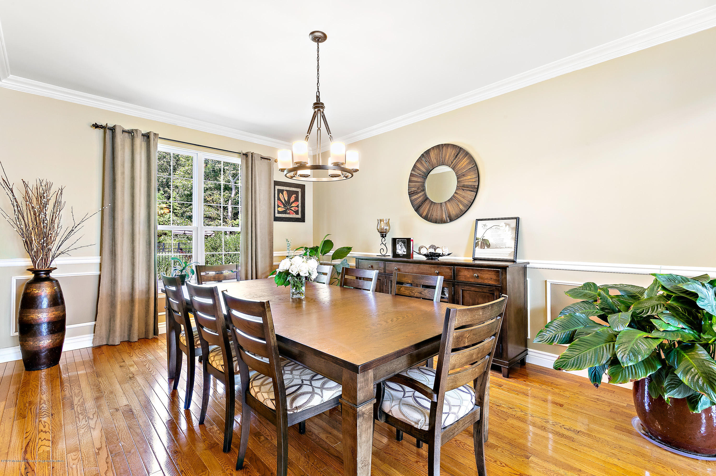 6 Emma Lane Jackson, NJ 08527 - Photo 12 of 39 a view of a dining room with furniture window and wooden floor