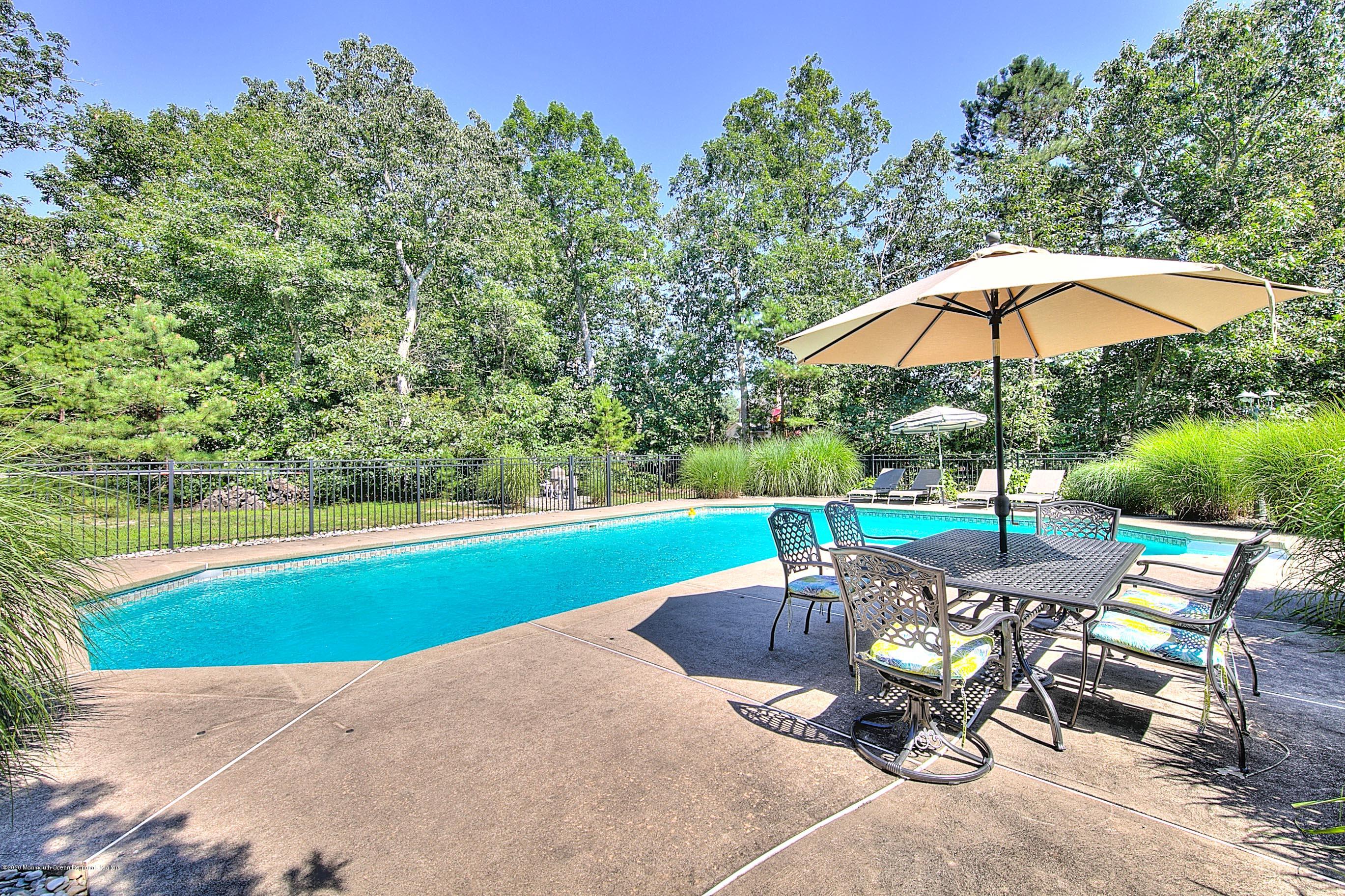 6 Emma Lane Jackson, NJ 08527 - Photo 2 of 39 a view of backyard with outdoor seating and trees