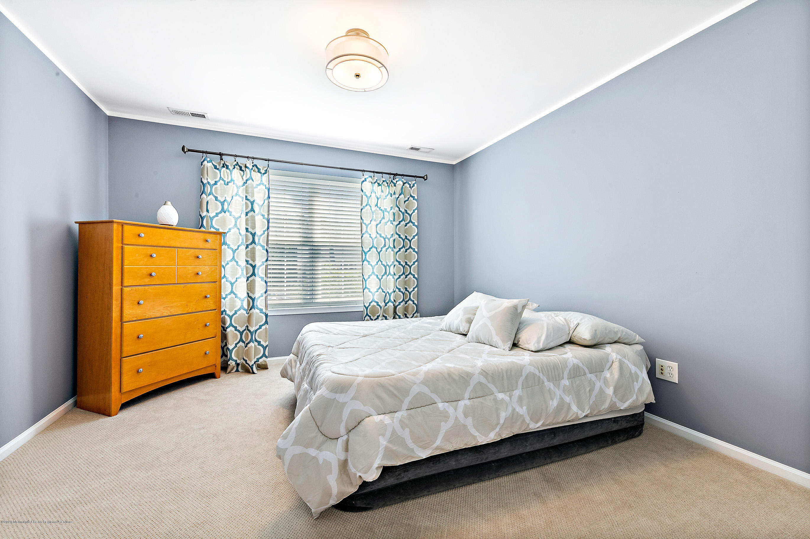 6 Emma Lane Jackson, NJ 08527 - Photo 24 of 39 a bedroom with a bed and window