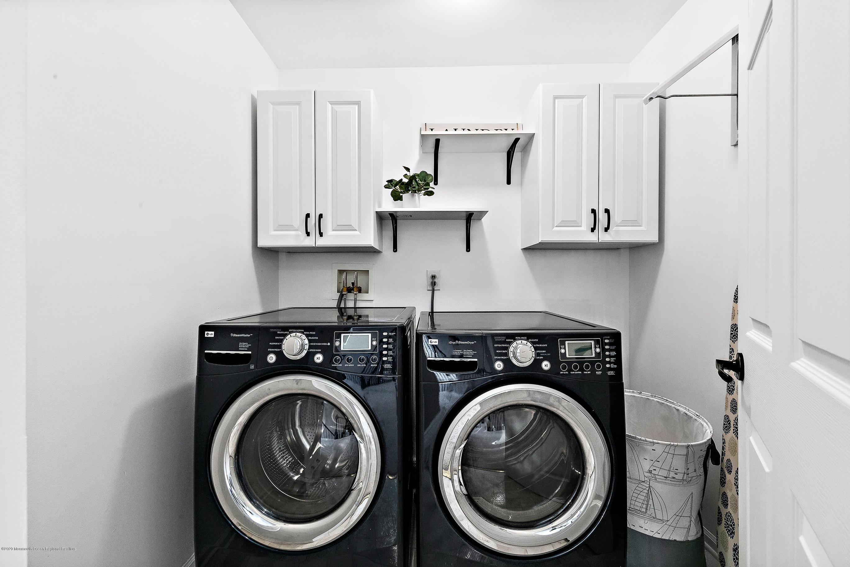 6 Emma Lane Jackson, NJ 08527 - Photo 26 of 39 a utility room with sink dryer and washer