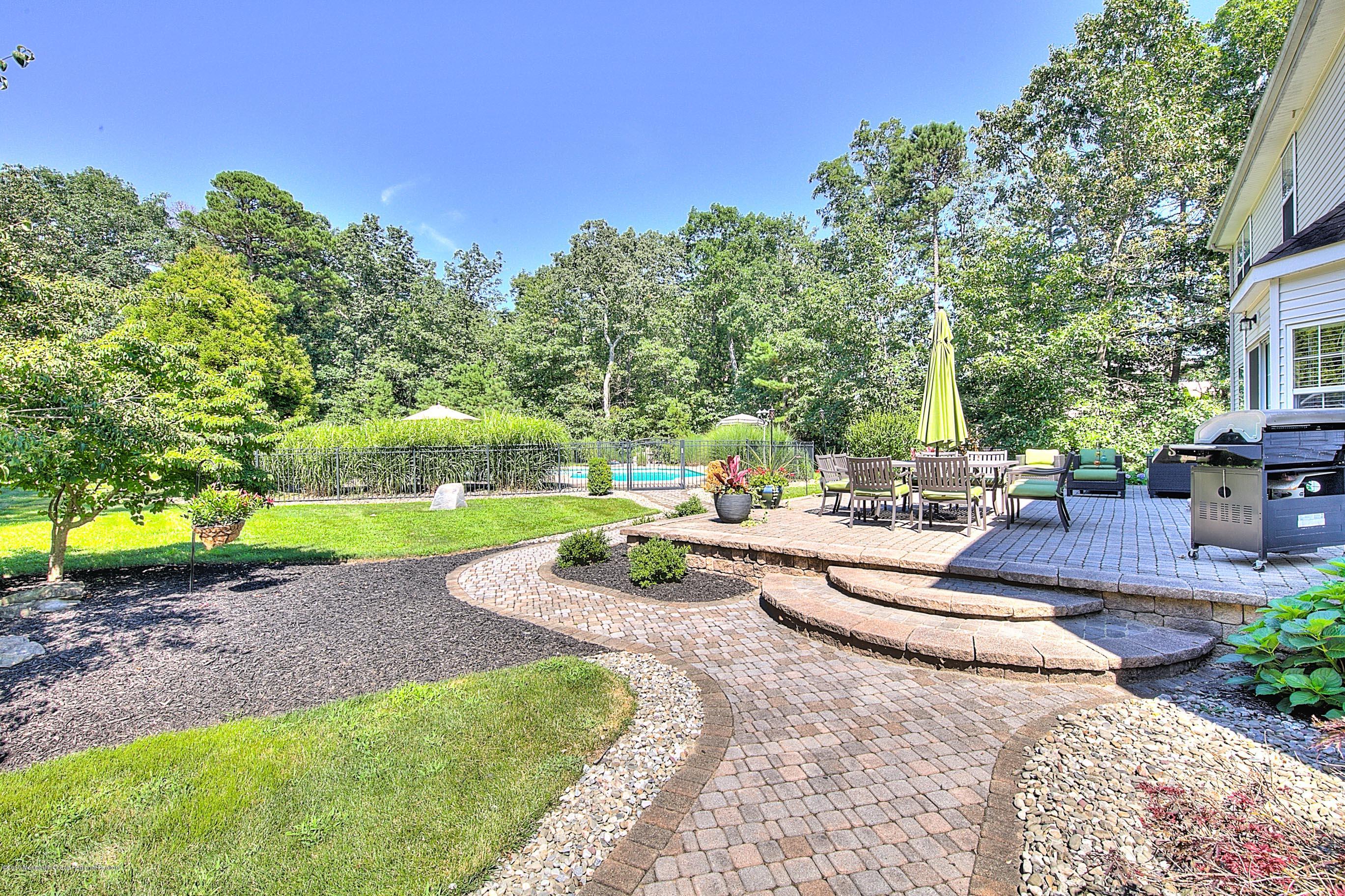 6 Emma Lane Jackson, NJ 08527 - Photo 32 of 39 a view of a backyard with swimming pool