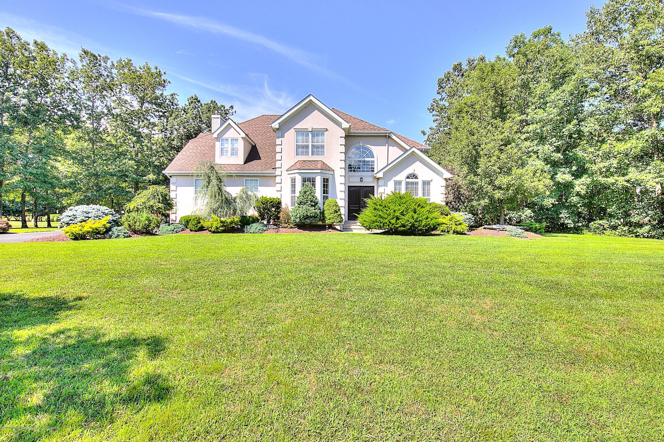 6 Emma Lane Jackson, NJ 08527 - Photo 39 of 39 a front view of a house with yard and green space