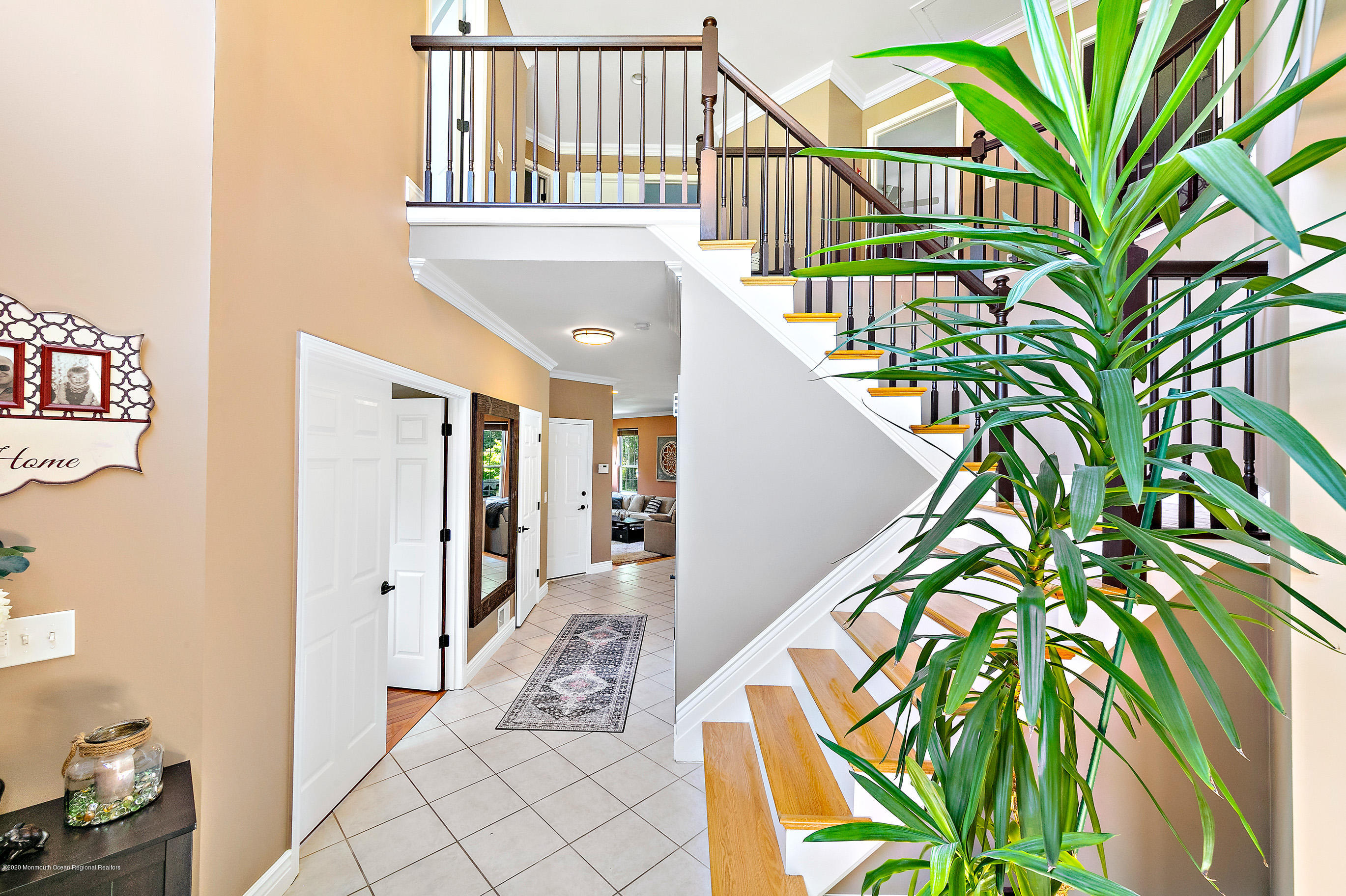 6 Emma Lane Jackson, NJ 08527 - Photo 4 of 39 a view of entryway with wooden floor and stairs