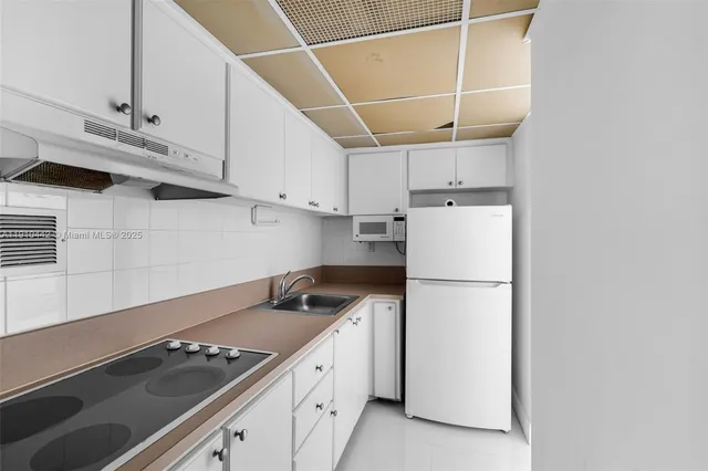 $249,000 | 1200 West Avenue, Unit PH12, Miami Beach, FL 33139