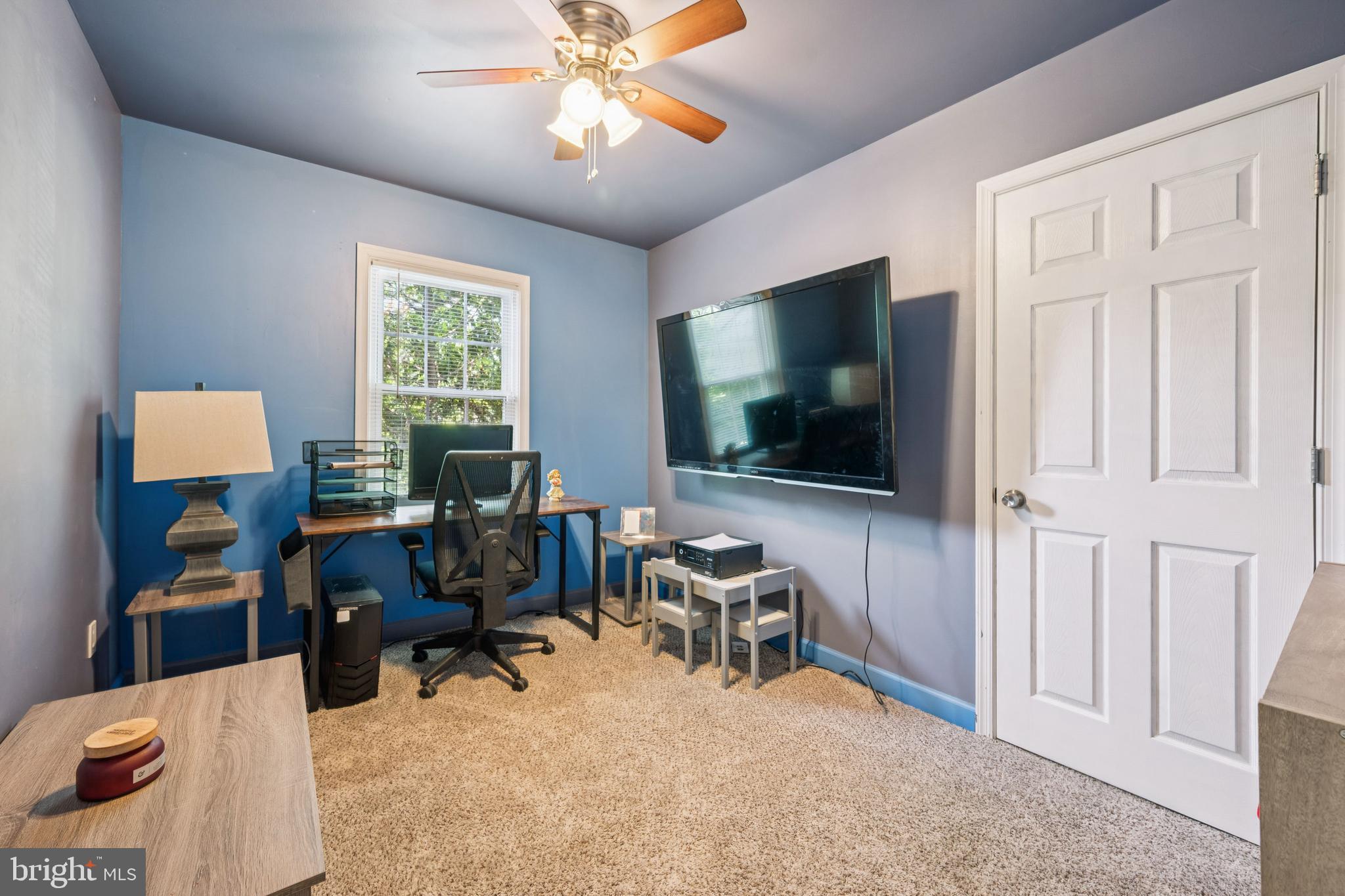 42 Chews Landing Road Clementon, NJ 08021 - Photo 14 of 30 a view of a livingroom with workspace and a window