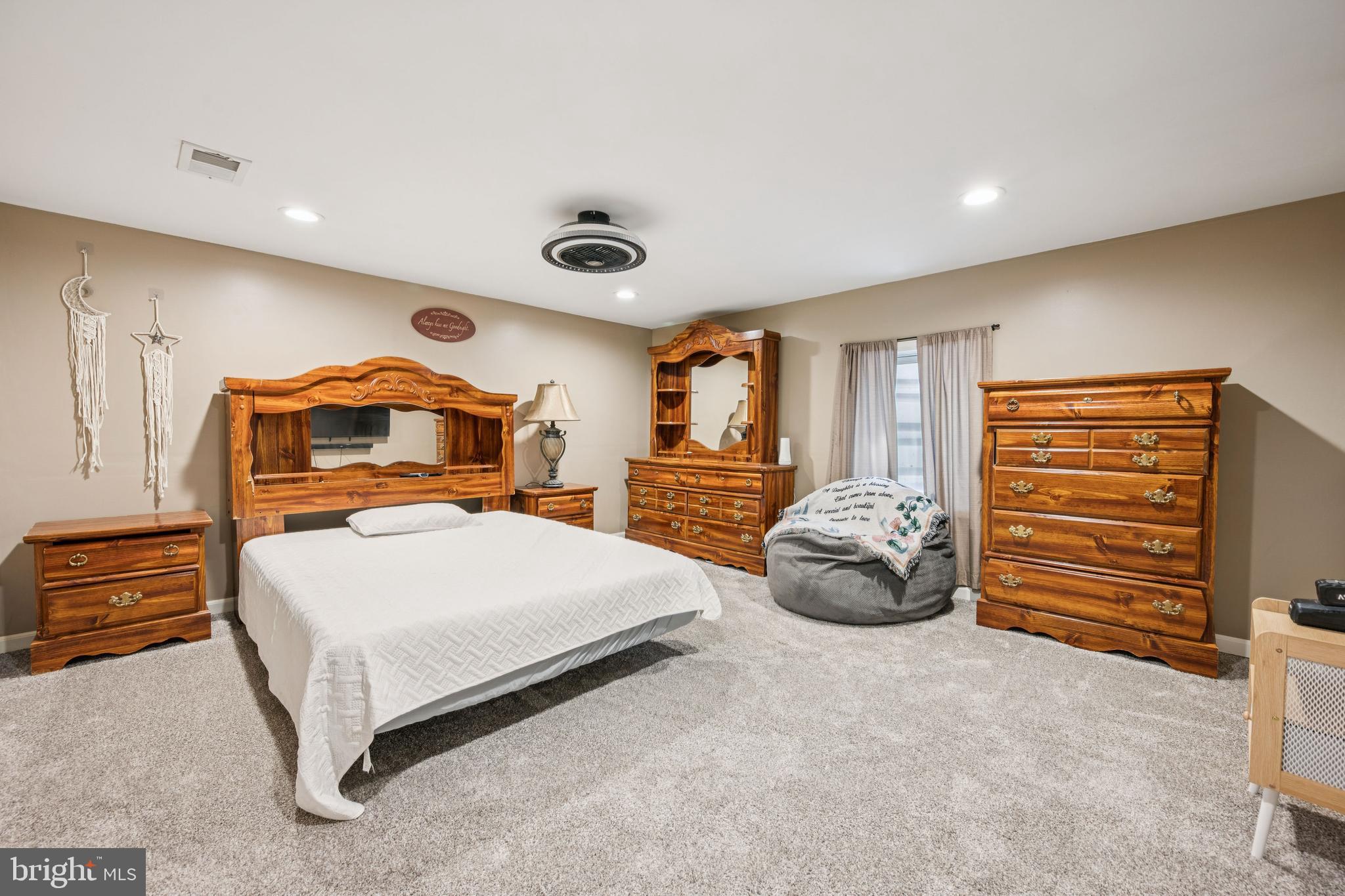 42 Chews Landing Road Clementon, NJ 08021 - Photo 18 of 30 a bedroom with a bed and a chandelier