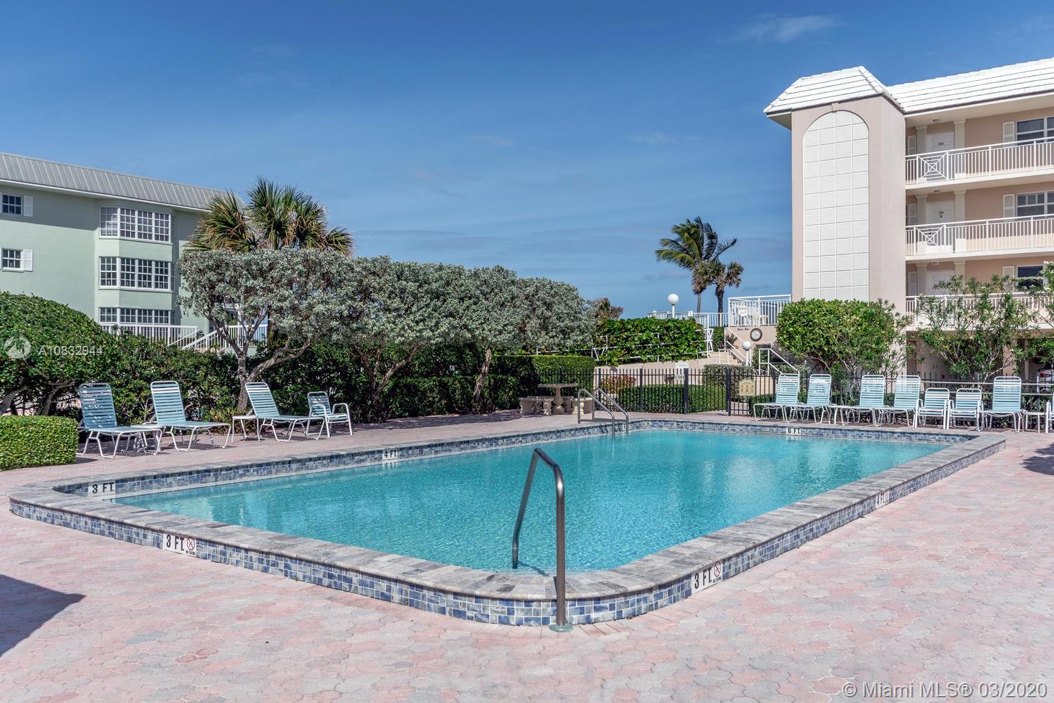 80 Celestial Way, Unit 108 Juno Beach, FL 33408 - Photo 26 of 34 Recently updated heated pool