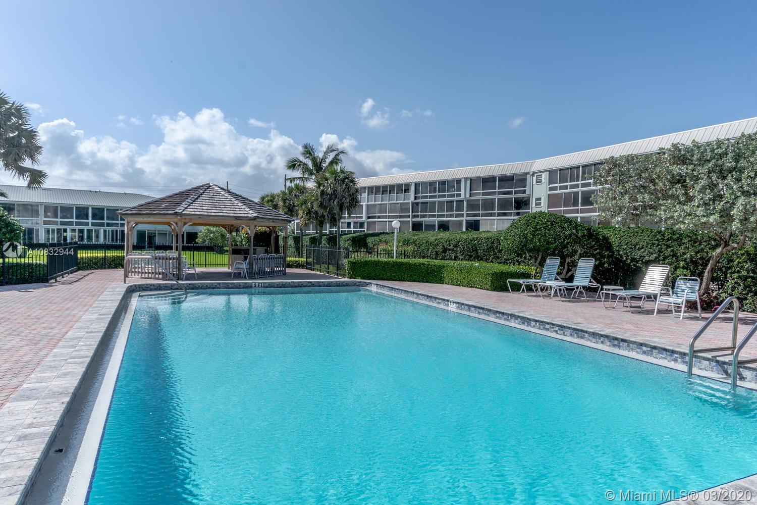 80 Celestial Way, Unit 108 Juno Beach, FL 33408 - Photo 27 of 34 Pool and cabana