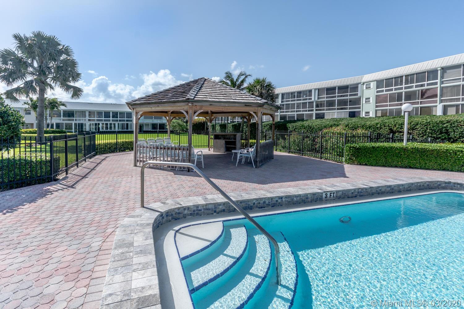 80 Celestial Way, Unit 108 Juno Beach, FL 33408 - Photo 28 of 34 Updated pool and sitting area