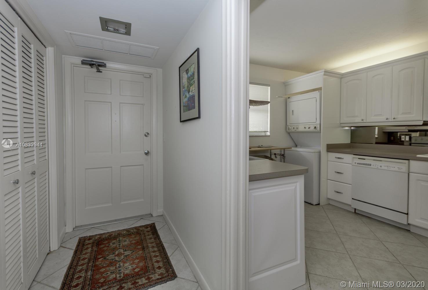 80 Celestial Way, Unit 108 Juno Beach, FL 33408 - Photo 6 of 34 Entry foyer and kitchen