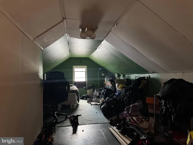 a view of a chairs and table in a patio