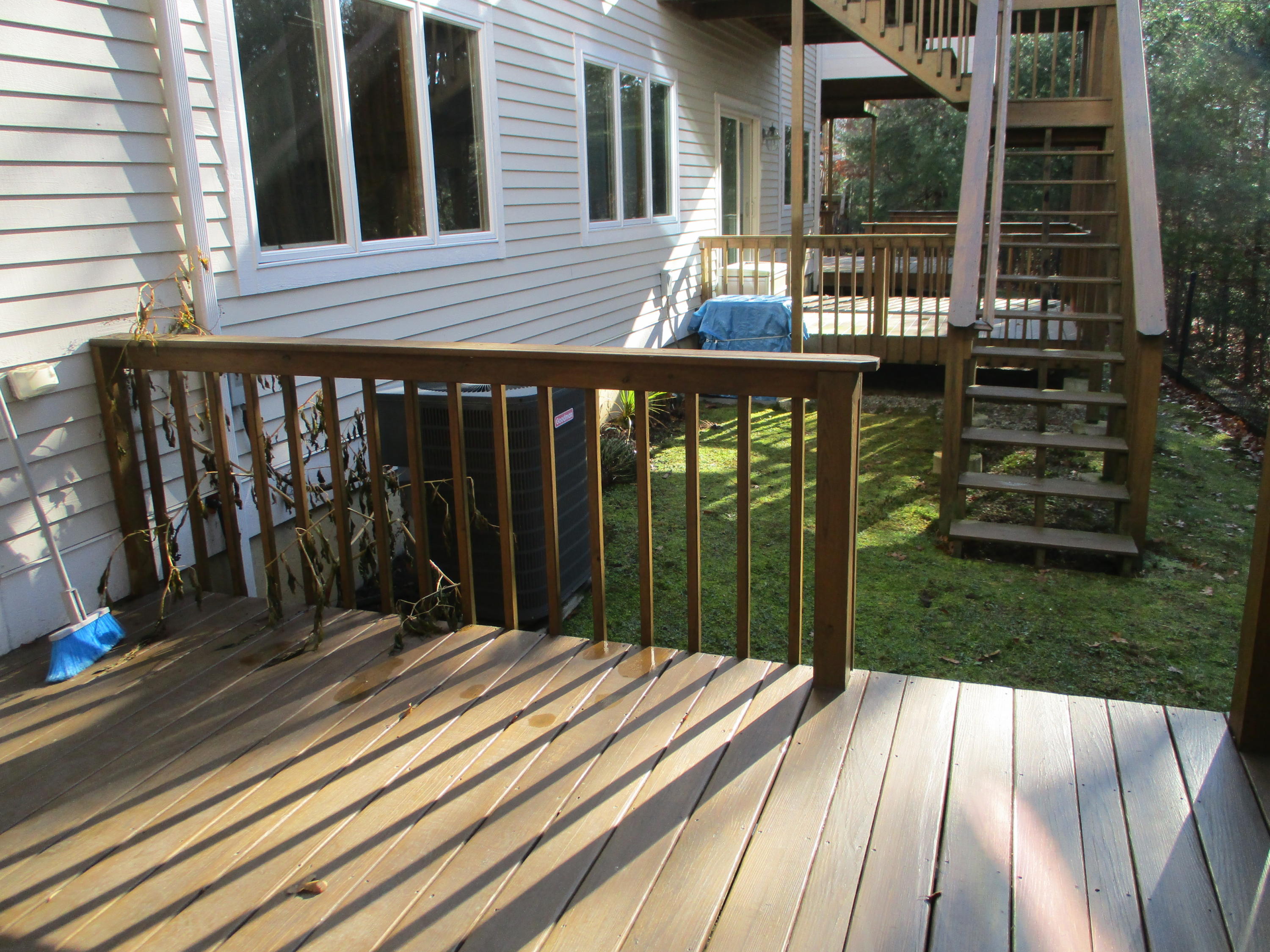 13 North Ridge Road, Unit 440 Mashpee, MA 02649 - Photo 14 of 30 a view of backyard with deck and outdoor seating