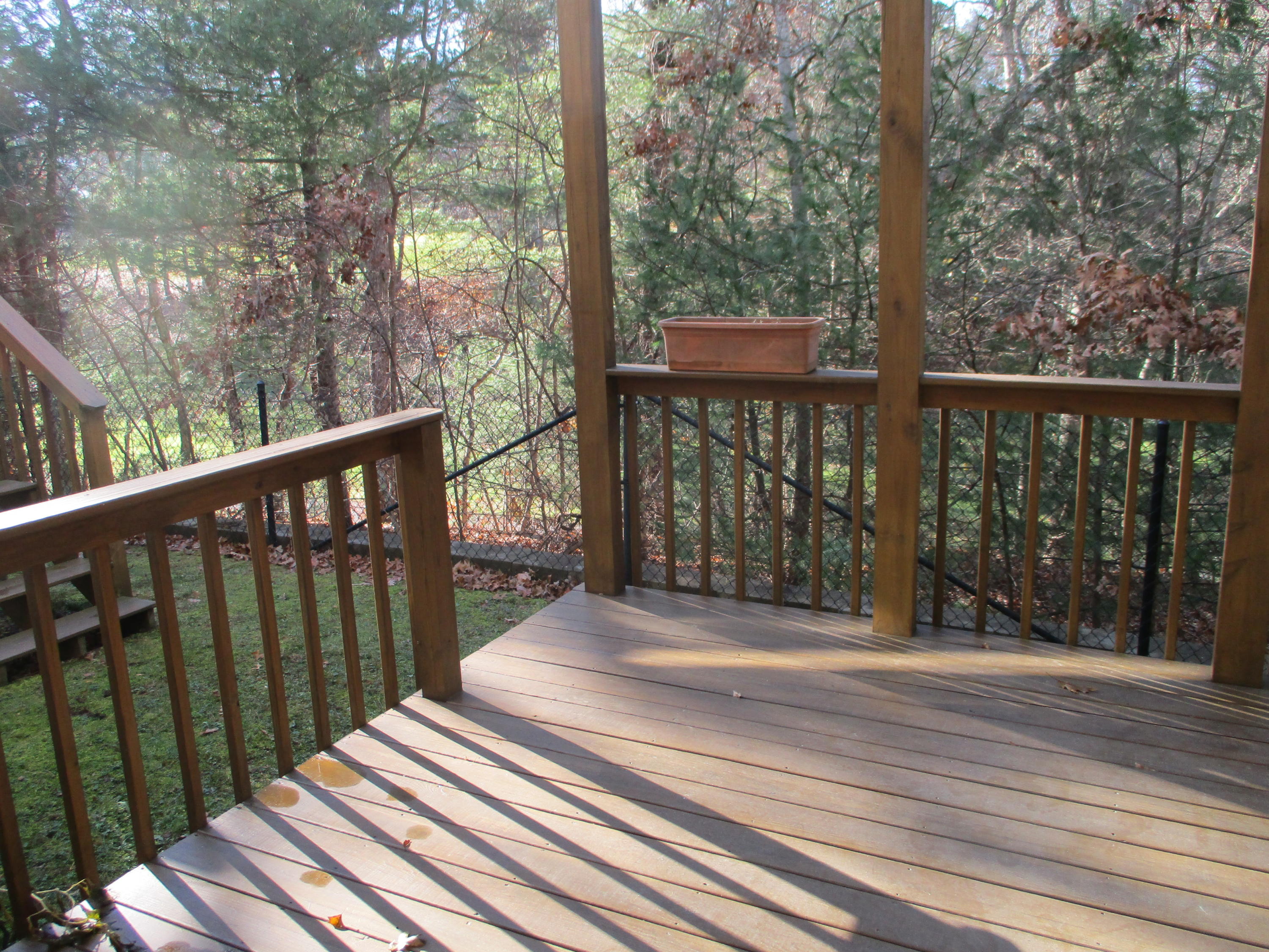 13 North Ridge Road, Unit 440 Mashpee, MA 02649 - Photo 16 of 30 a view of a wooden deck