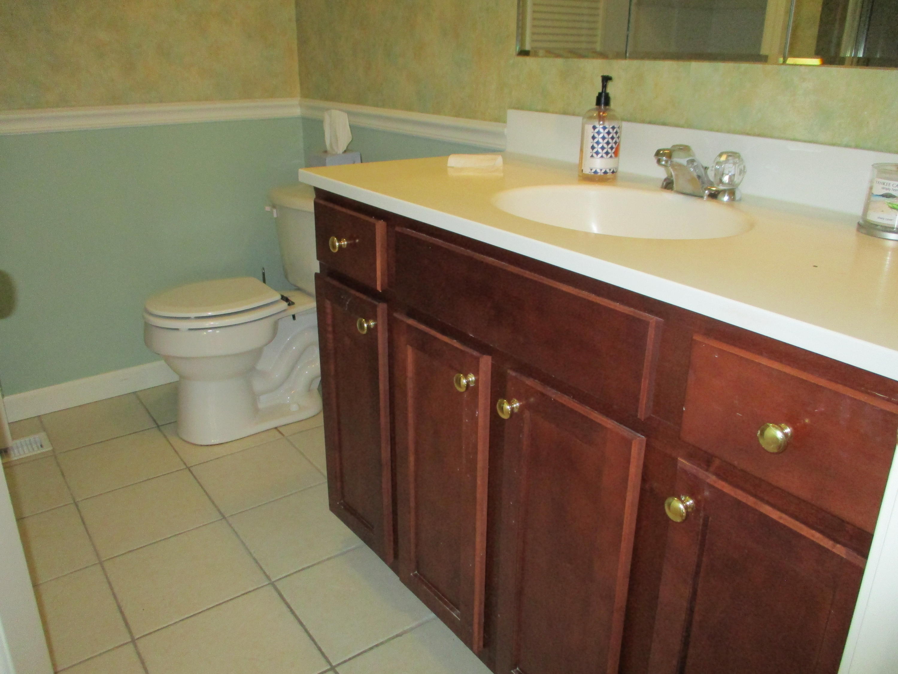 13 North Ridge Road, Unit 440 Mashpee, MA 02649 - Photo 19 of 30 a bathroom with a sink and a toilet