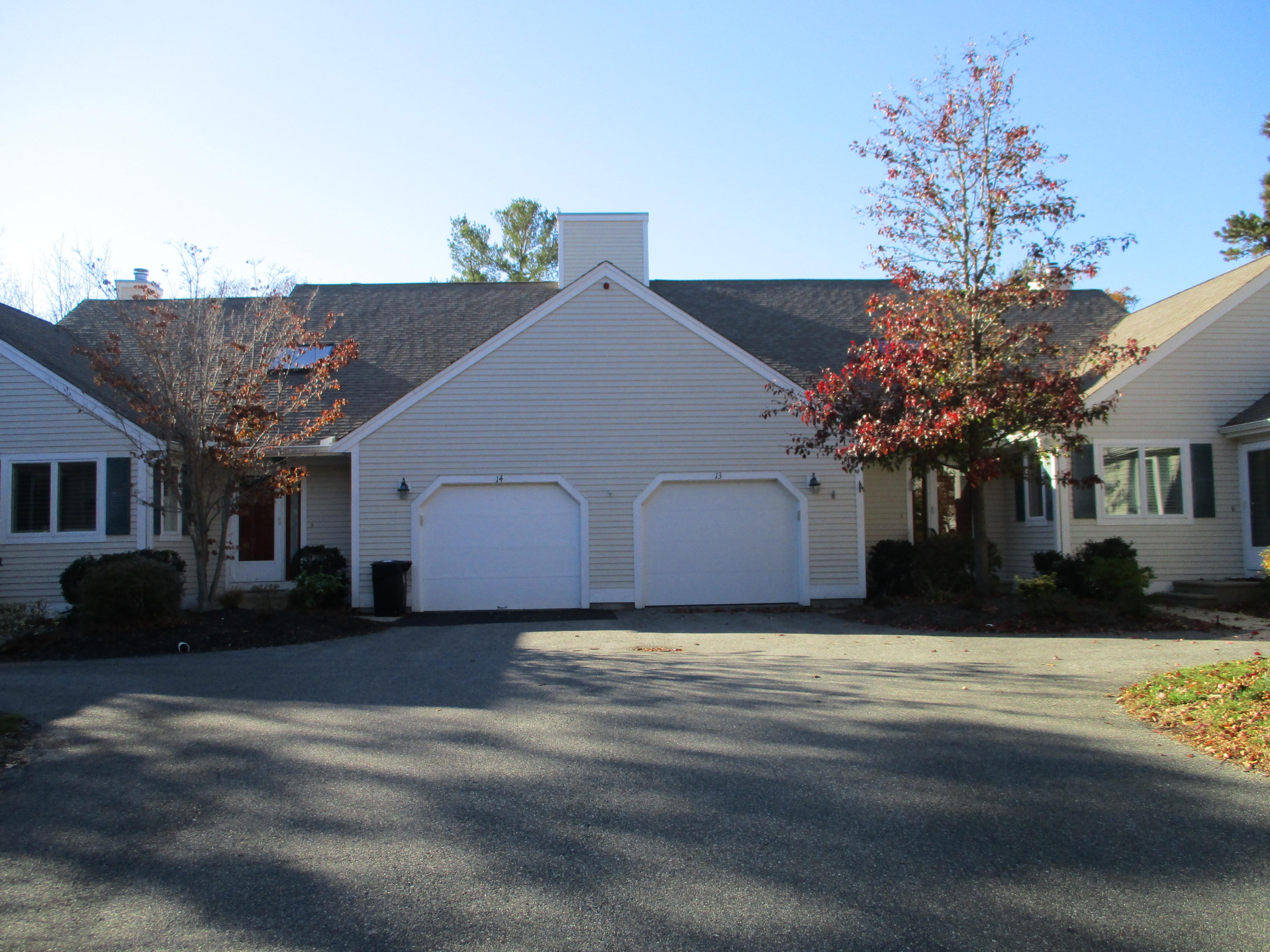 13 North Ridge Road, Unit 440 Mashpee, MA 02649 - Photo 2 of 30 a view of a house with a yard
