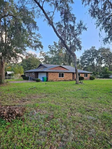 a view of a house with a big yard