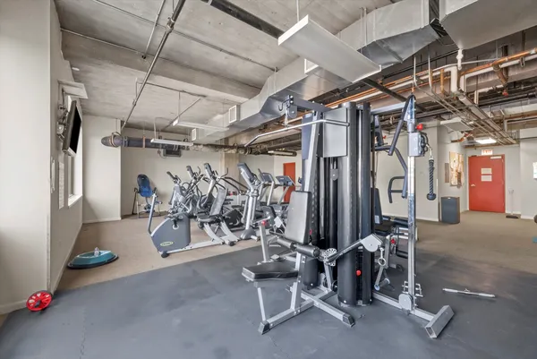 a view of a room with gym equipment