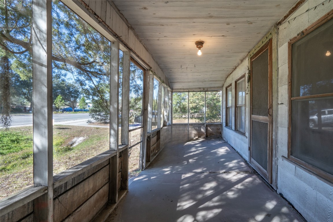 464135 State Road 200 Yulee, FL 32097 - Photo 12 of 27 a view of a large room with large windows