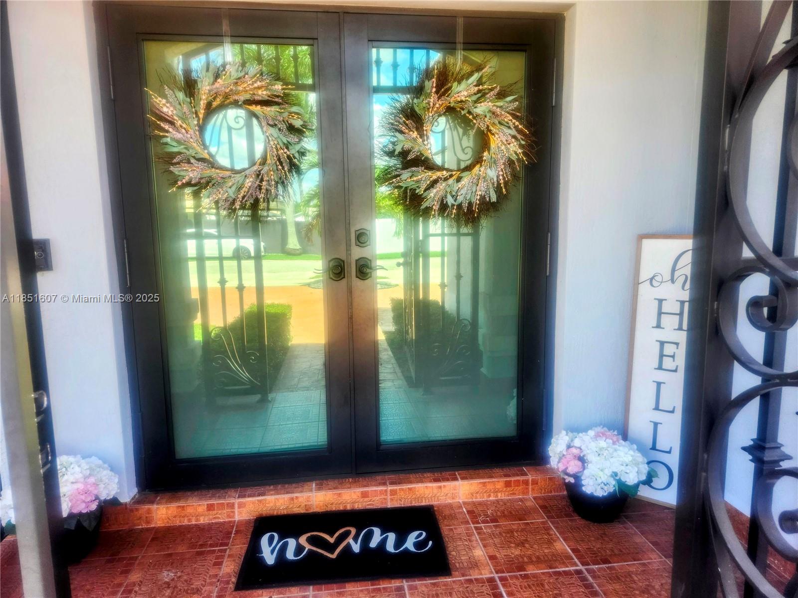 17833 Southwest 155th Court Miami, FL 33187 - Photo 2 of 22 a view of a entryway