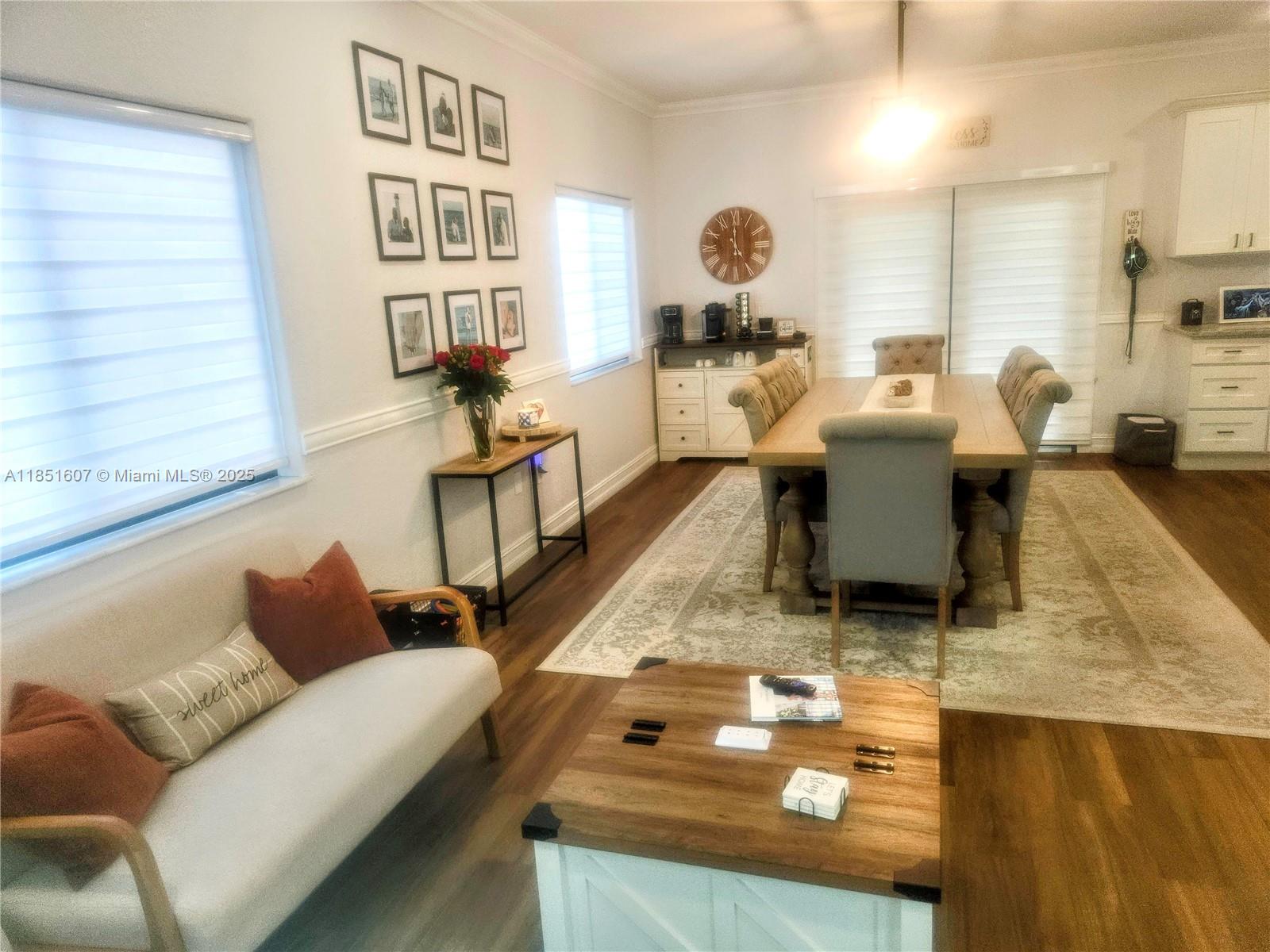 17833 Southwest 155th Court Miami, FL 33187 - Photo 5 of 22 a living room with furniture and a table