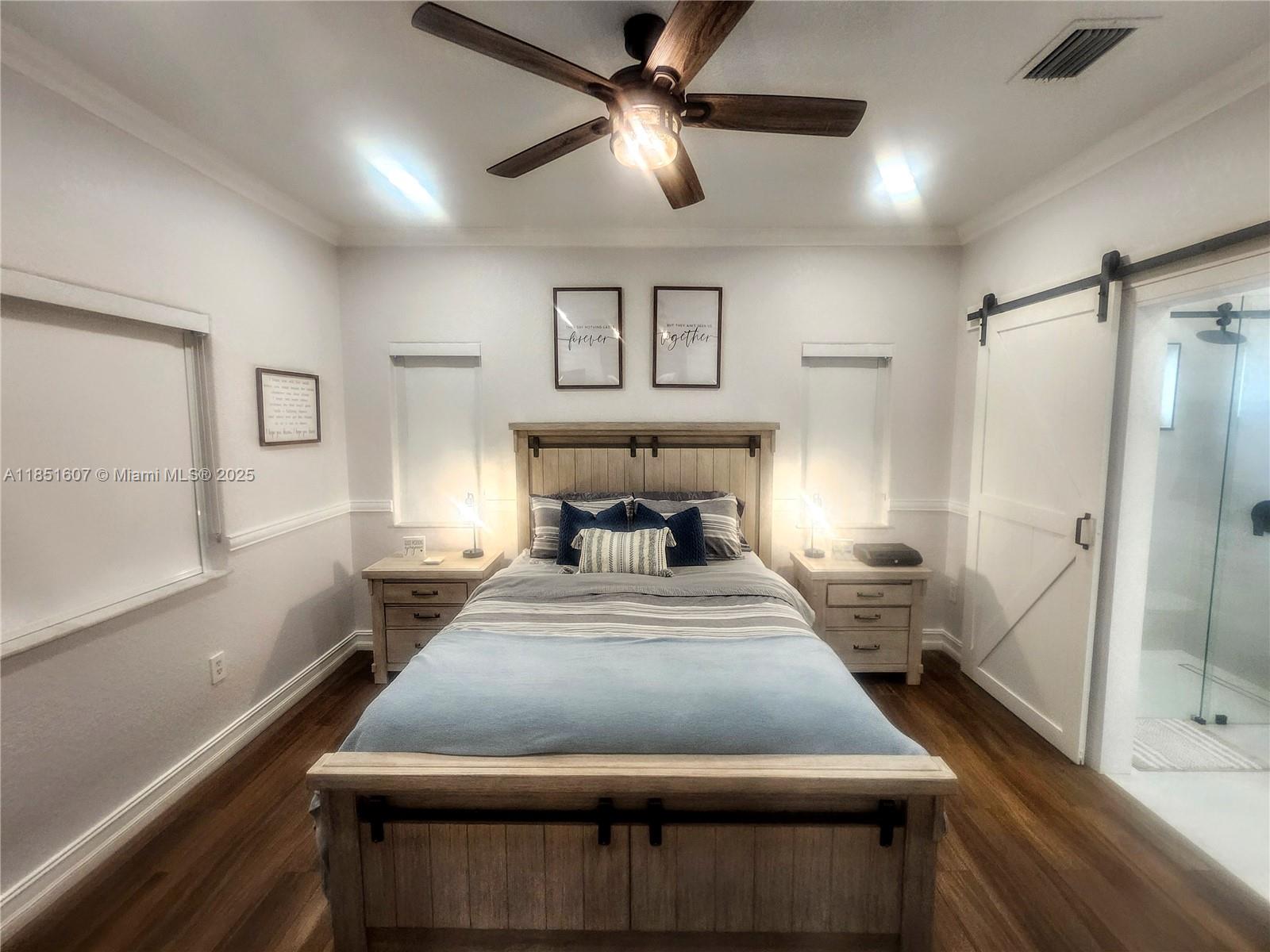 17833 Southwest 155th Court Miami, FL 33187 - Photo 10 of 22 a bedroom with a bed and window