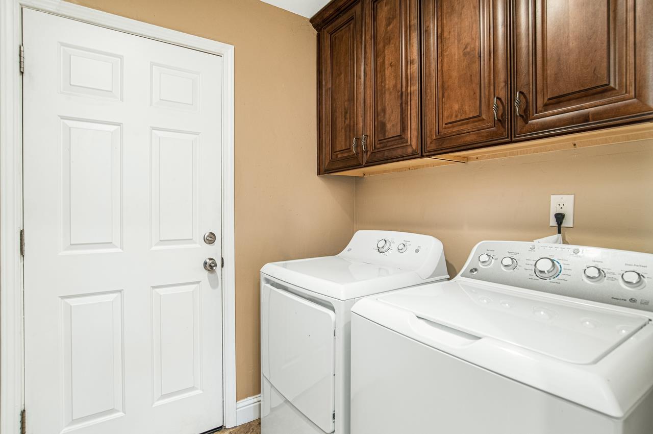 5644 Schooner Loop Discovery Bay, CA 94505 - Photo 16 of 42 a utility room with dryer and washer