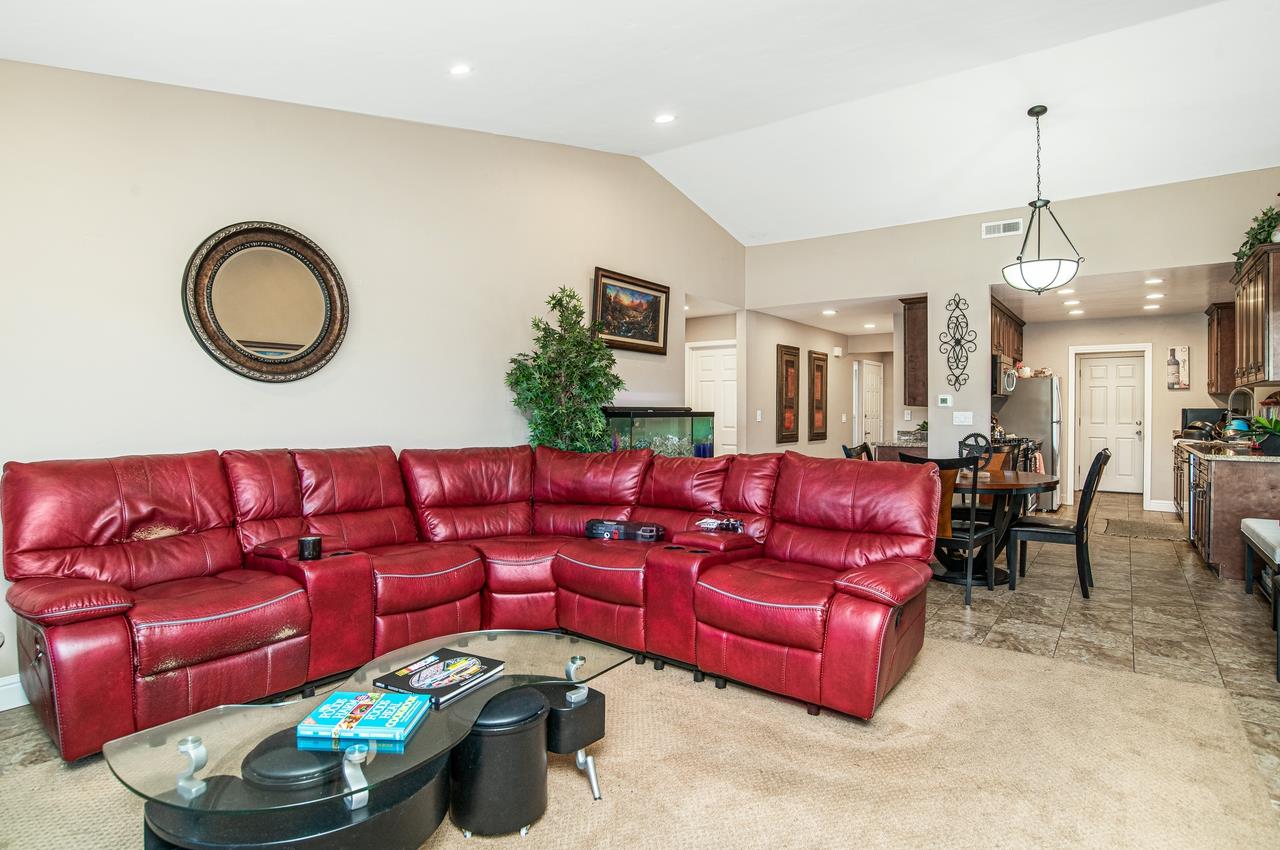 5644 Schooner Loop Discovery Bay, CA 94505 - Photo 21 of 42 a living room with furniture and a large window
