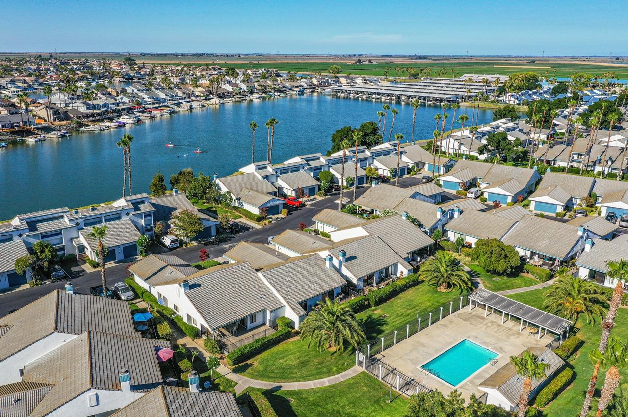 5644 Schooner Loop Discovery Bay, CA 94505 - Photo 37 of 42 an aerial view of a house with a lake view