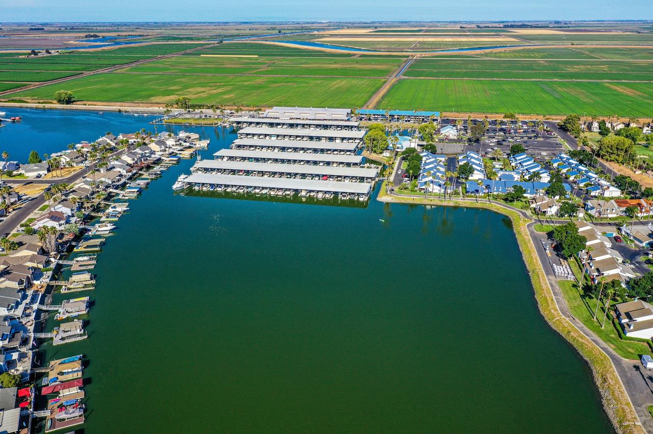 5644 Schooner Loop Discovery Bay, CA 94505 - Photo 40 of 42 a view of a golf course with a lake