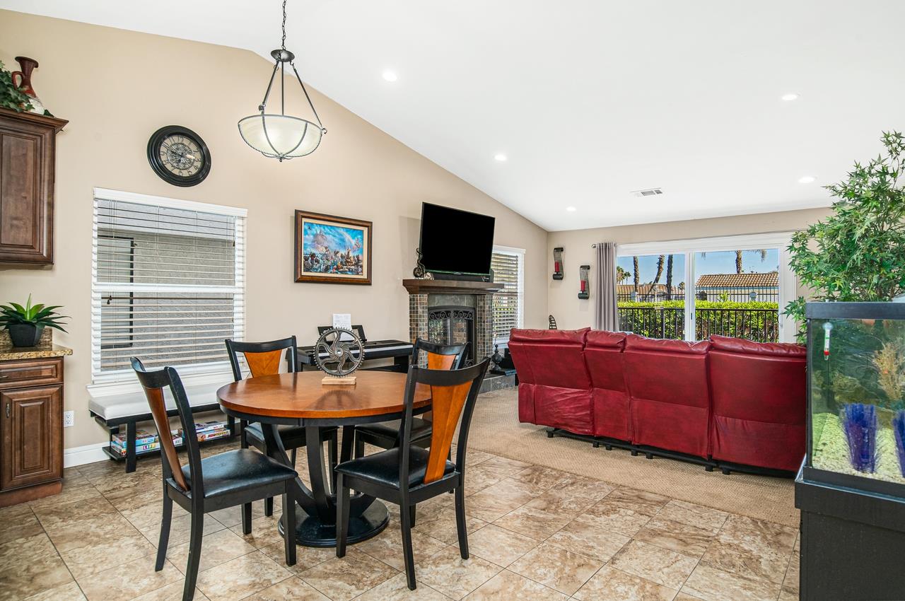 5644 Schooner Loop Discovery Bay, CA 94505 - Photo 10 of 42 a view of a dining room with furniture window and wooden floor