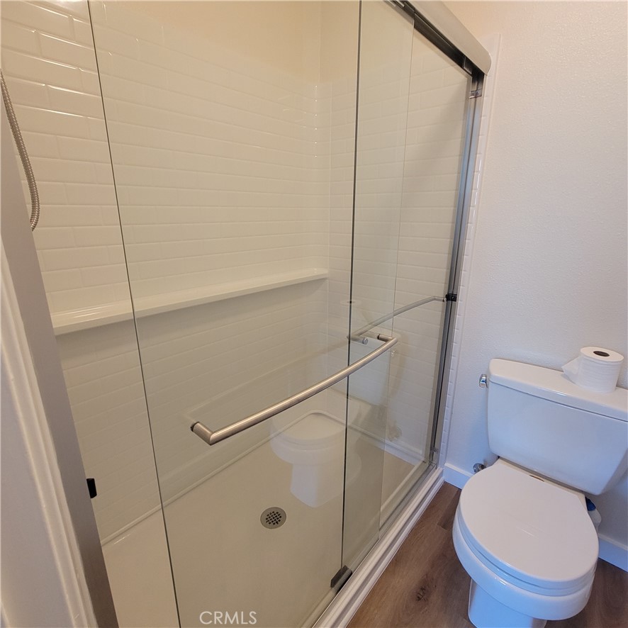 11 Meadowsweet Way Irvine, CA 92612 - Photo 21 of 35 a white toilet sitting next to a shower