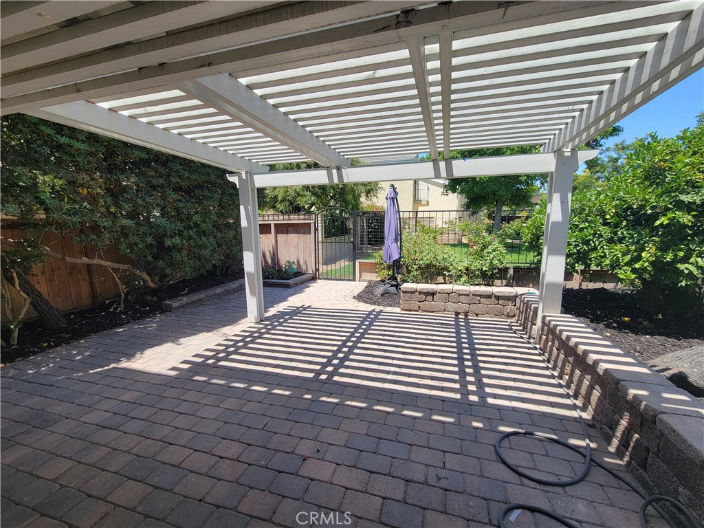 11 Meadowsweet Way Irvine, CA 92612 - Photo 24 of 35 a view of a patio with table and chairs potted plants with wooden floor