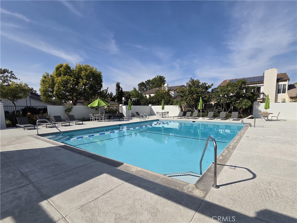 11 Meadowsweet Way Irvine, CA 92612 - Photo 33 of 35 a view of a swimming pool with a patio