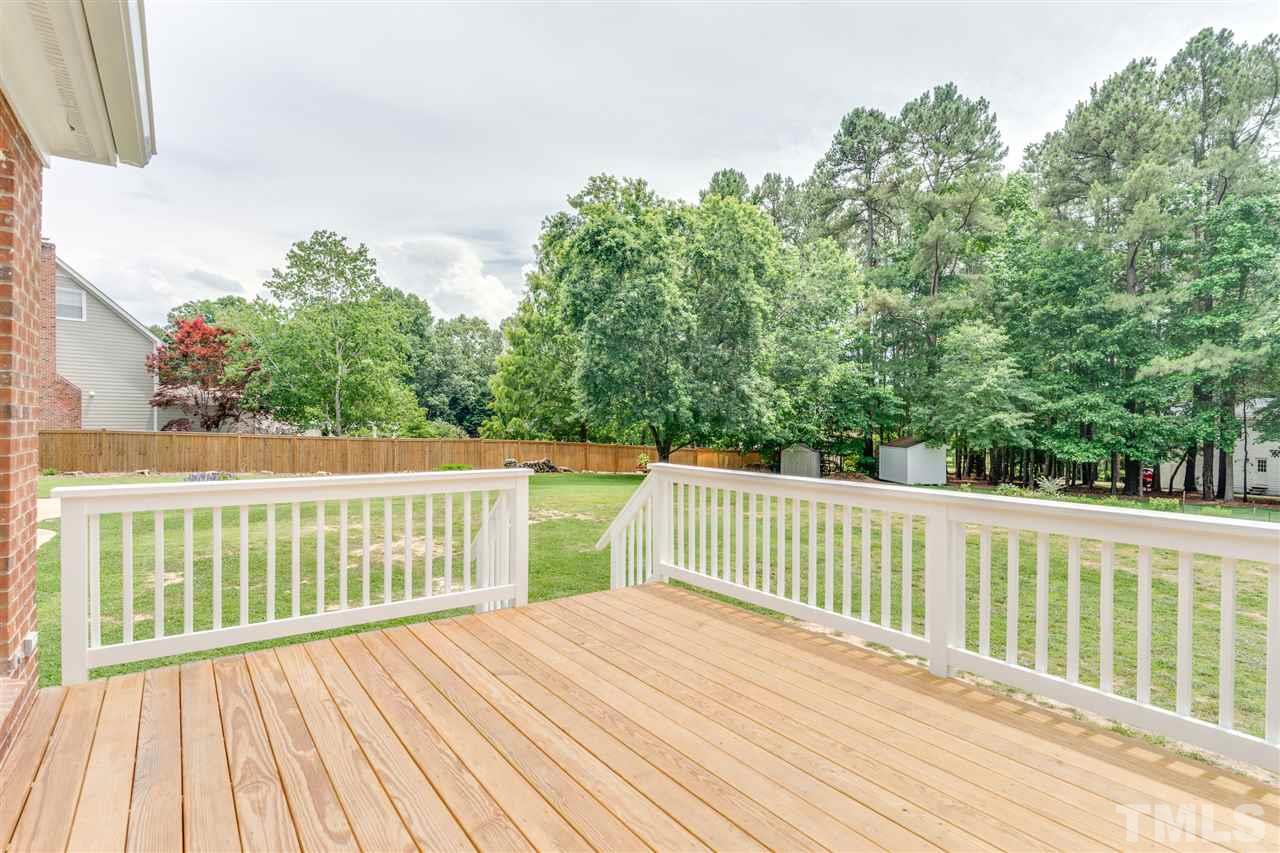 3905 Inland Court Raleigh, NC 27606 - Photo 22 of 24 The large deck overlooks the spacious backyard... B.Y.O.G (bring your own grill)!