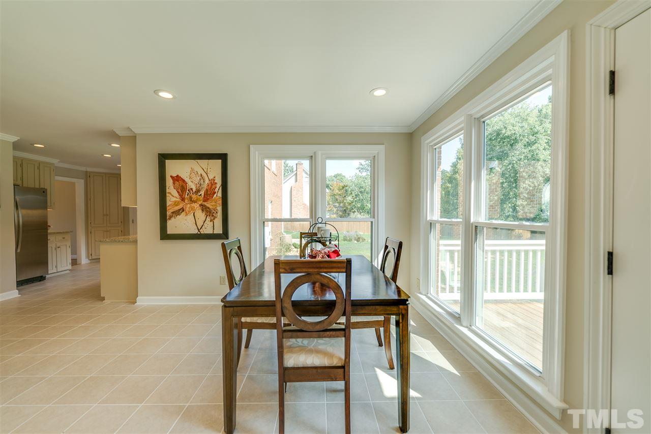 3905 Inland Court Raleigh, NC 27606 - Photo 8 of 24 Enjoy a cup of coffee or a quick meal while overlooking the beautiful backyard!