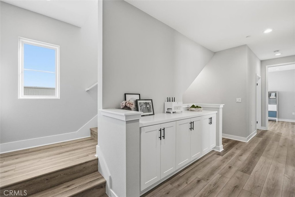 2144 Swallowtail Walk Gardena, CA 90249 - Photo 43 of 59 Hallway and stairs to the loft/family room/balcony