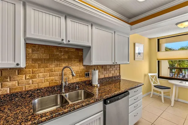 $400,000 | 9495 Blind Pass Road, Unit 202, St. Pete Beach, FL 33706