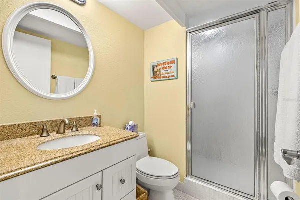 $400,000 | 9495 Blind Pass Road, Unit 202, St. Pete Beach, FL 33706